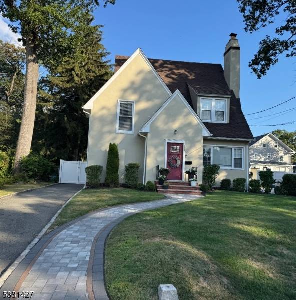 This beautifully renovated two story home features four spacious bedrooms and three and a half modern bathrooms.