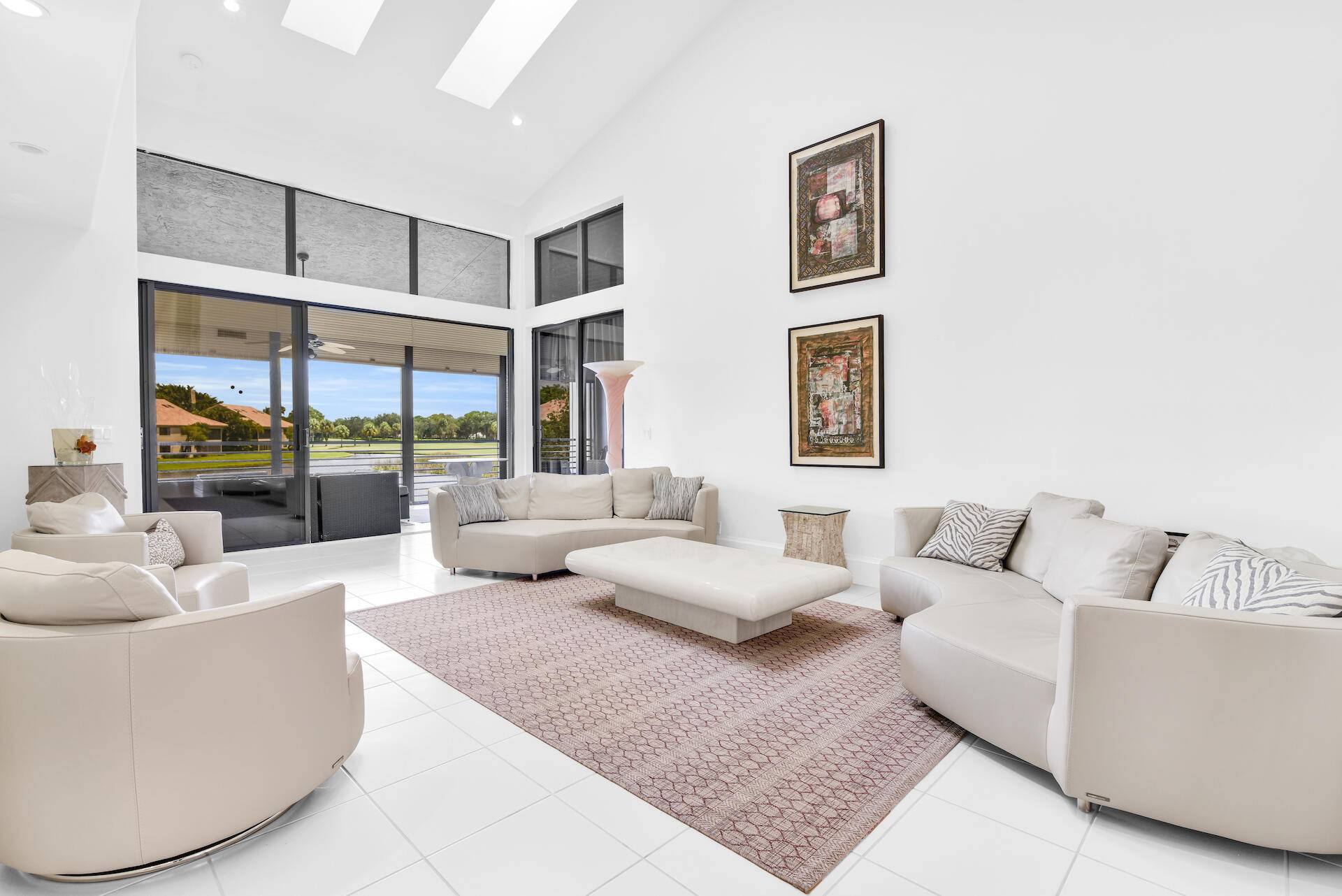 Stunning lake views are the showstopping feature of this penthouse, end unit condo rental in The Polo Club.