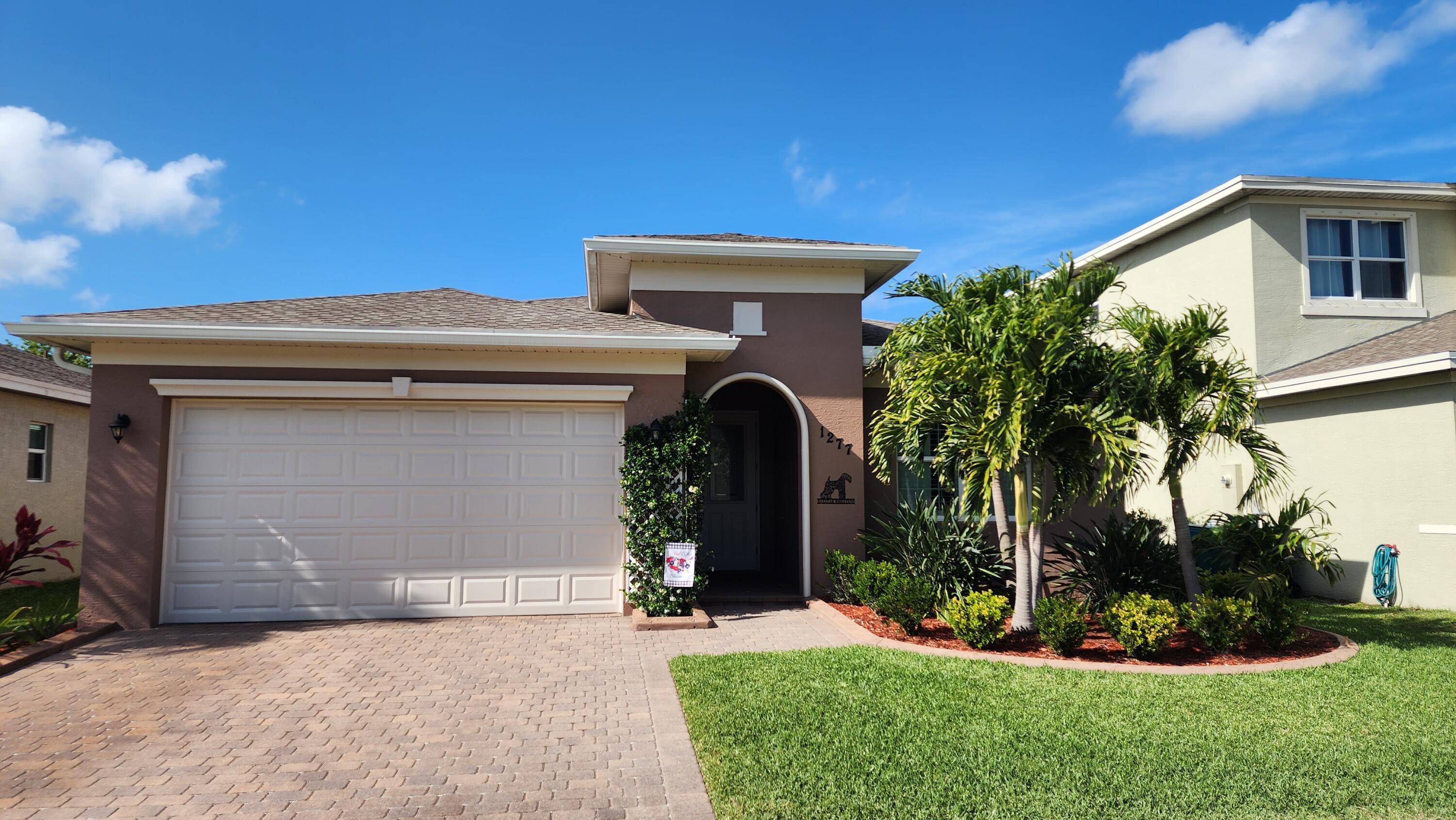 Welcome home to this inviting oasis nestled within the serene gated community of Vizcaya Falls.
