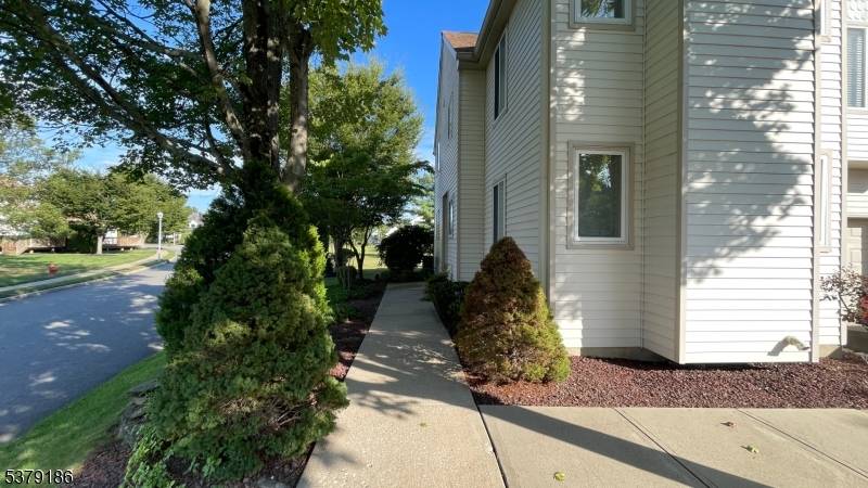 Stunning updated end unit townhouse in The Meadows at Montville featuring 3 bedrooms, 2.