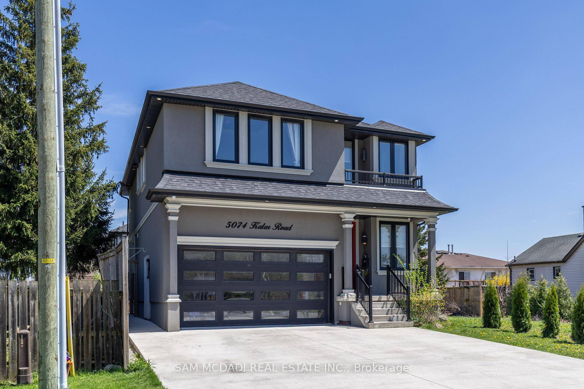 This Gorgeous NEWLY Built CUSTOM HOME is Sure to Impress !