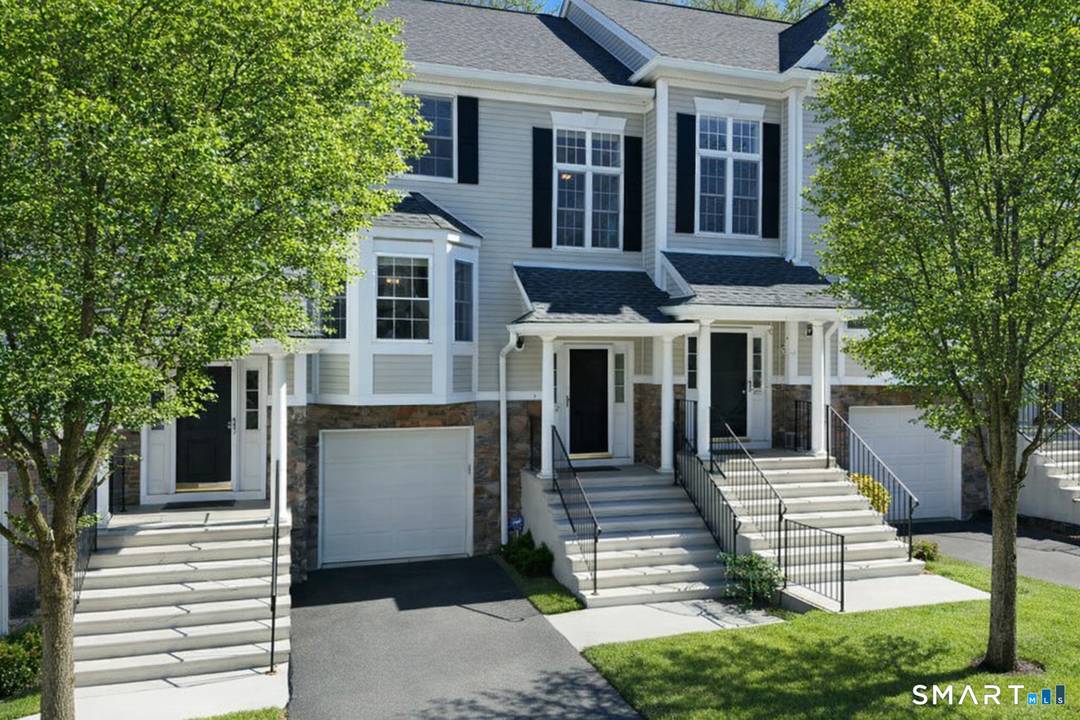 Enjoy effortless living in this impeccable tri level Acorn model townhome offering exceptional natural light and privacy in the sought after Sterling Woods community.