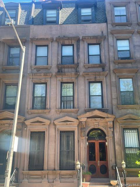Occupied Brownstone building on a historic, landmarked block.