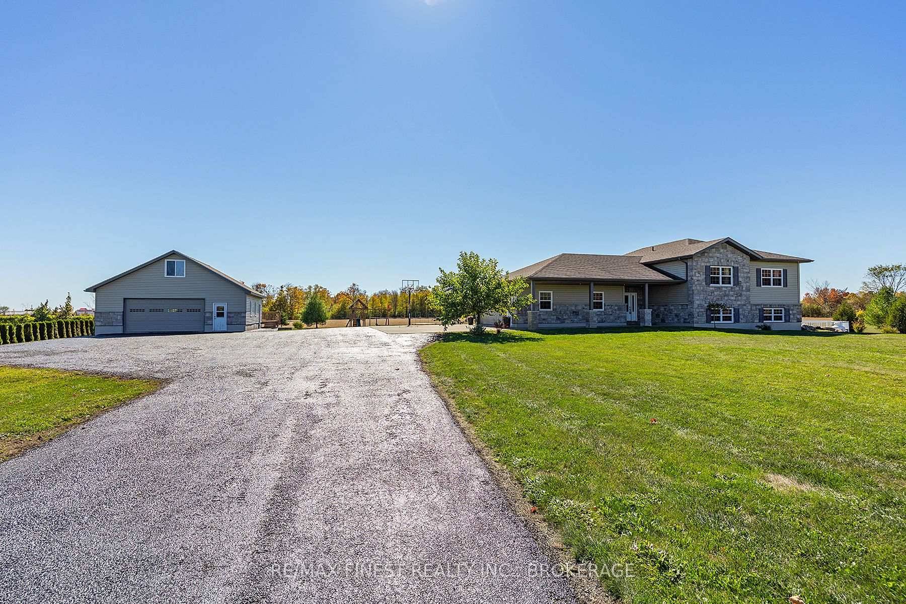 Welcome to this stunning 1, 608 sq ft custom built bungalow 2011, by Paul Soucie, nestled on over 2 acres and thoughtfully designed for comfort, function, and fun !