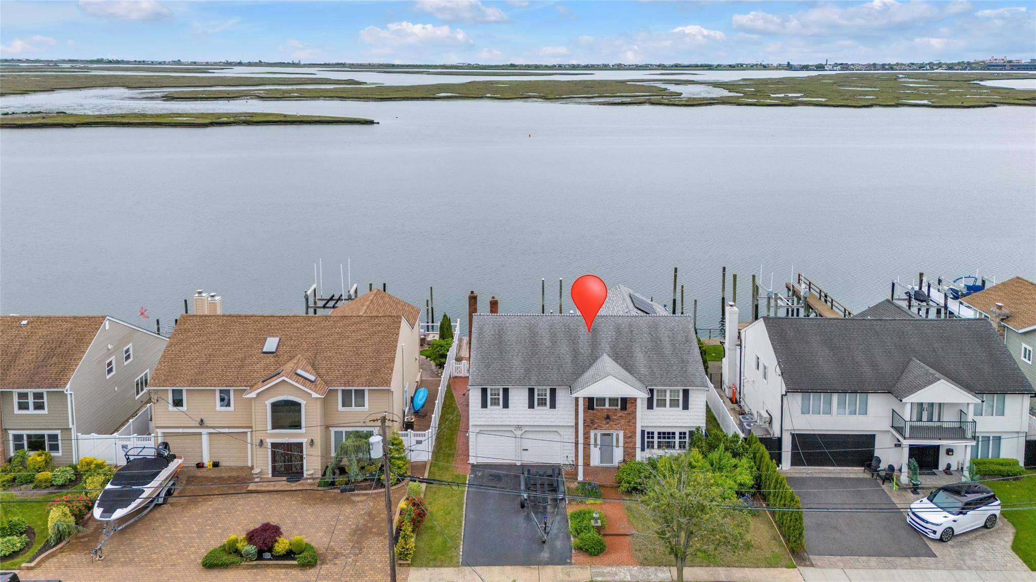 HUGE PRICE IMPROVEMENT ! This your opportunity own waterfront property on one of Oceanside's most sought after streets.