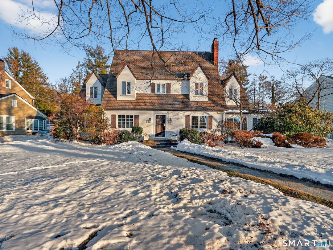 Welcome to 59 Broadfield Rd, a stunning Tudor set on a beautifully landscaped lot in Hamden's desirable Spring Glen neighborhood.