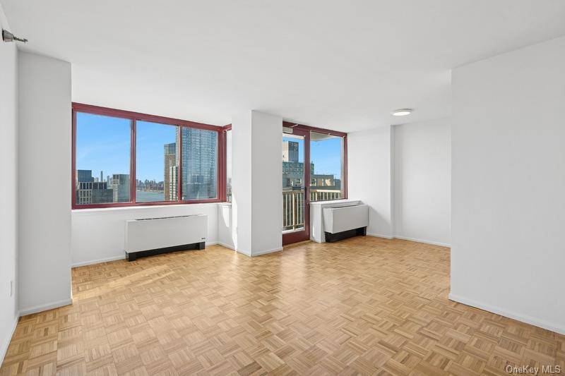 Breathtaking Southern Views of the Manhattan Skyline and East River greet you immediately upon entering this exquisite 2BR 2BA with Dining area and Balcony.