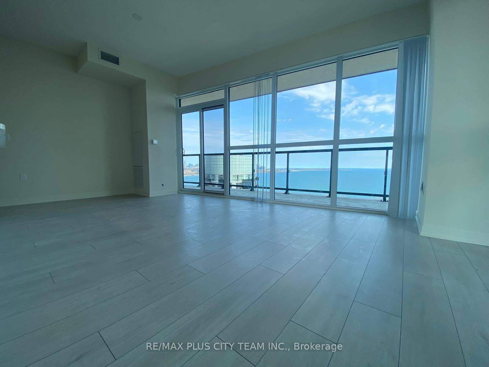 Welcome to this stunning, never lived in corner suite located just steps from the lake.