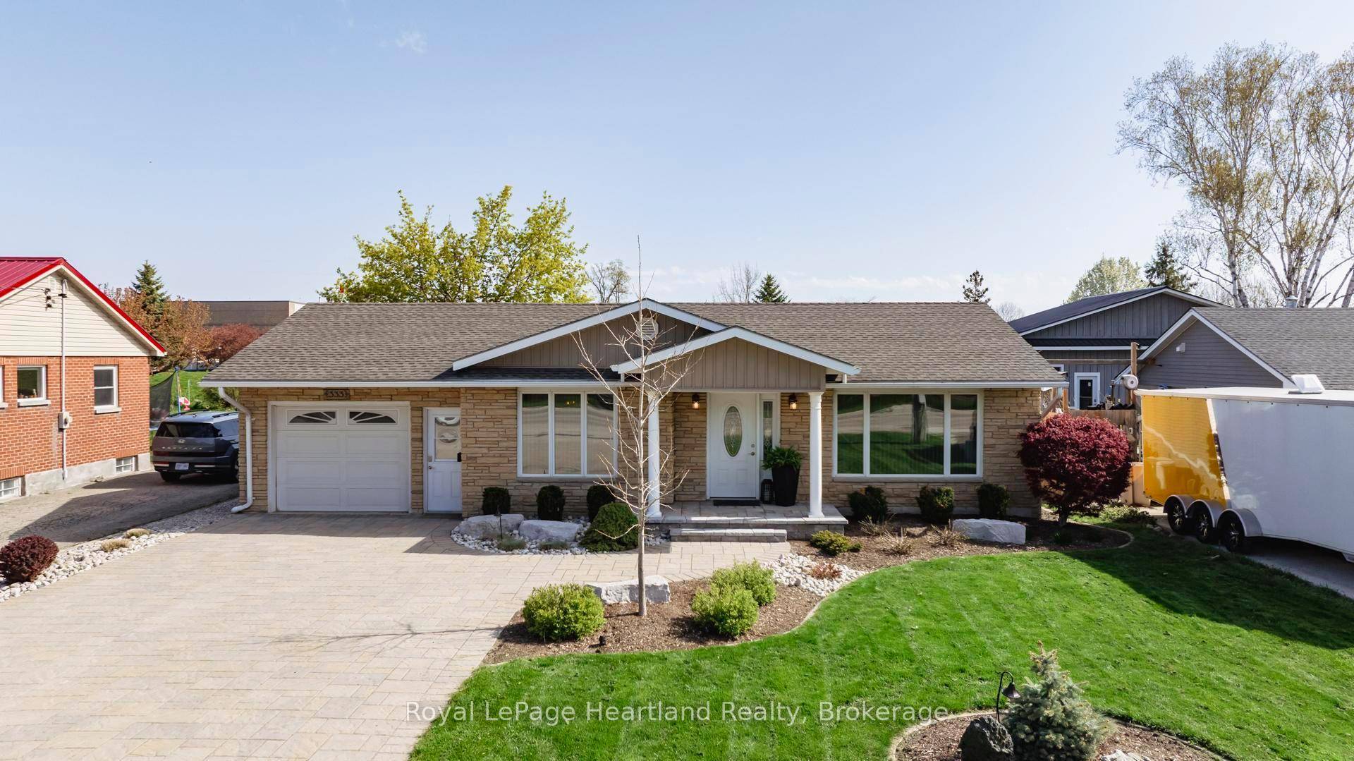 Welcome to this pristine and immaculate brick bungalow in Clinton, where pride of ownership is evident from the moment you arrive.