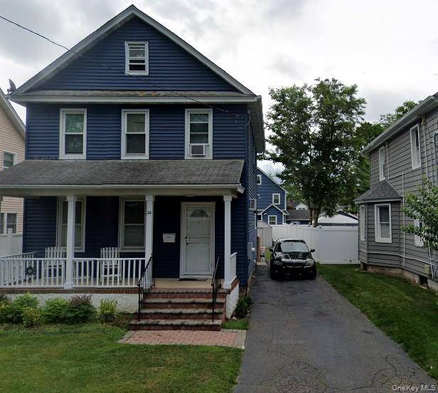 Charming Custom Built Colonial in Westbury s Desirable West Village Section Step onto the inviting open porch and into a home filled with warmth and character.