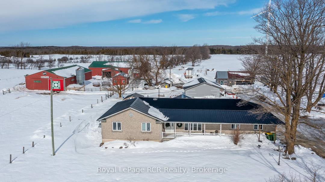 100 acre farm in Grey Highlands on a paved road.