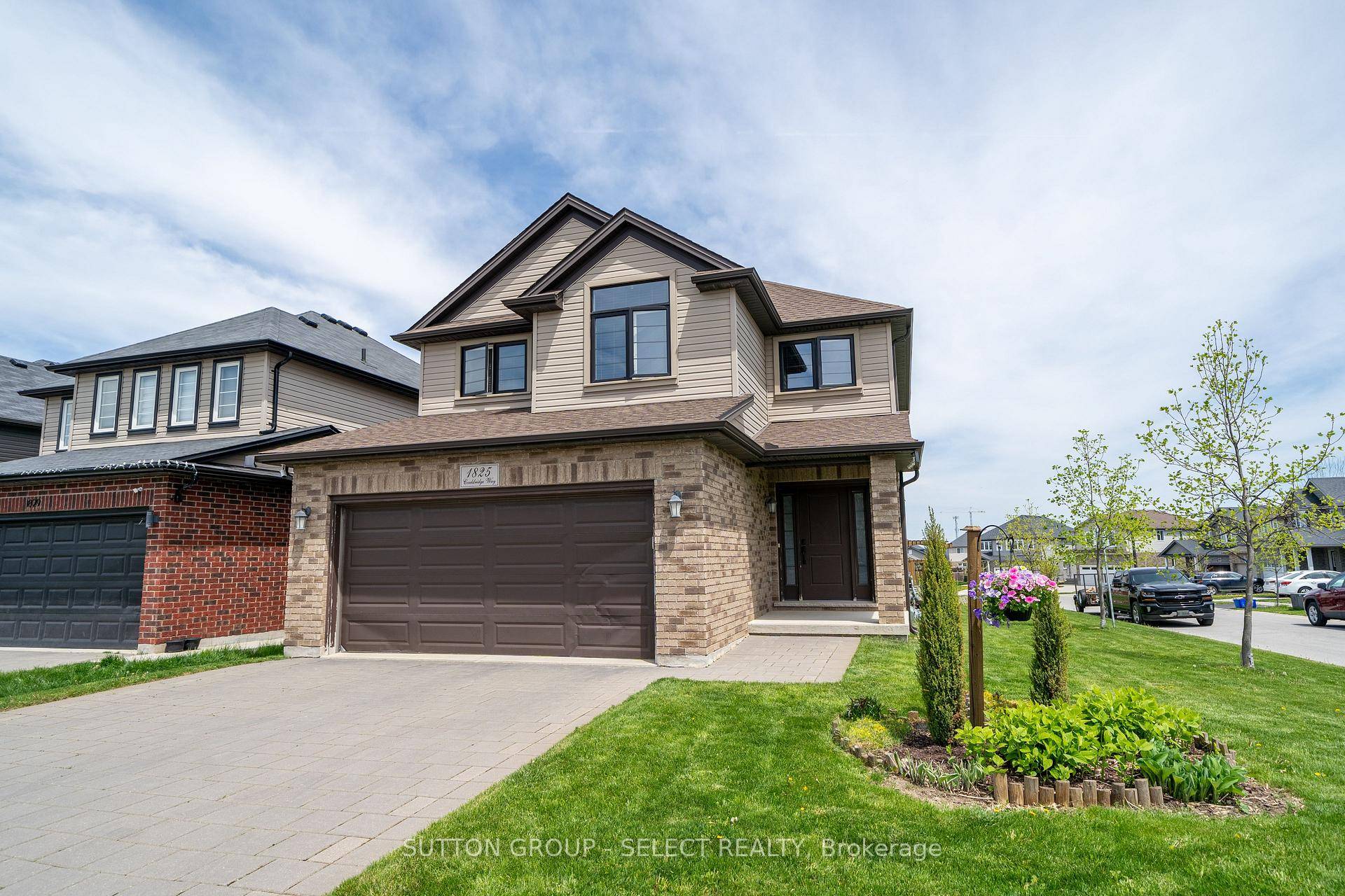 This spacious two storey home offers an open concept layout with a bright great room featuring hardwood floors and a gas fireplace.