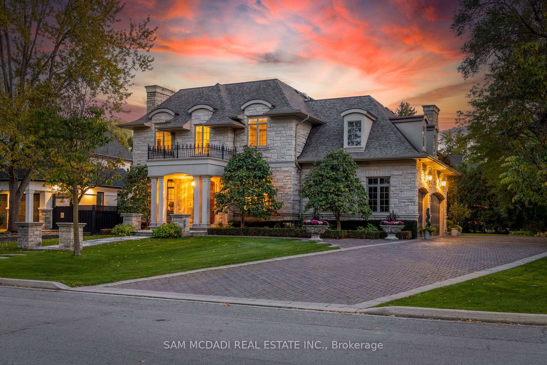 Immerse yourself in the sought after Lorne Park community offering this unparalleled Parisian chic custom estate exuding luxury at every turn.