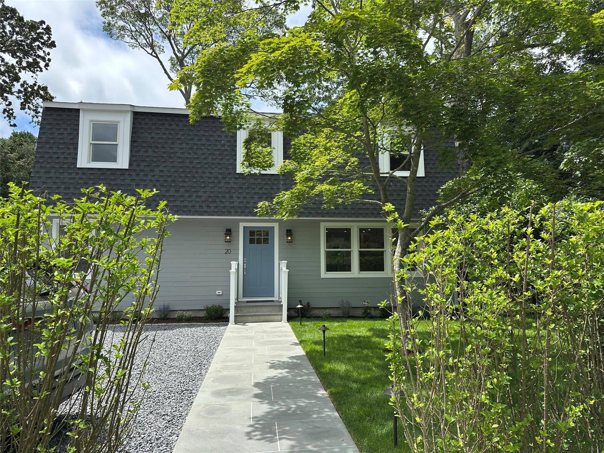 SOUTHAMPTON 5 HOUSES FROM BEAUTIFUL LITTLE PECONIC BAY BEACH This beautifully gut renovated home with its classic Mansard roof offers the perfect blend of timeless architecture and modern comfort.