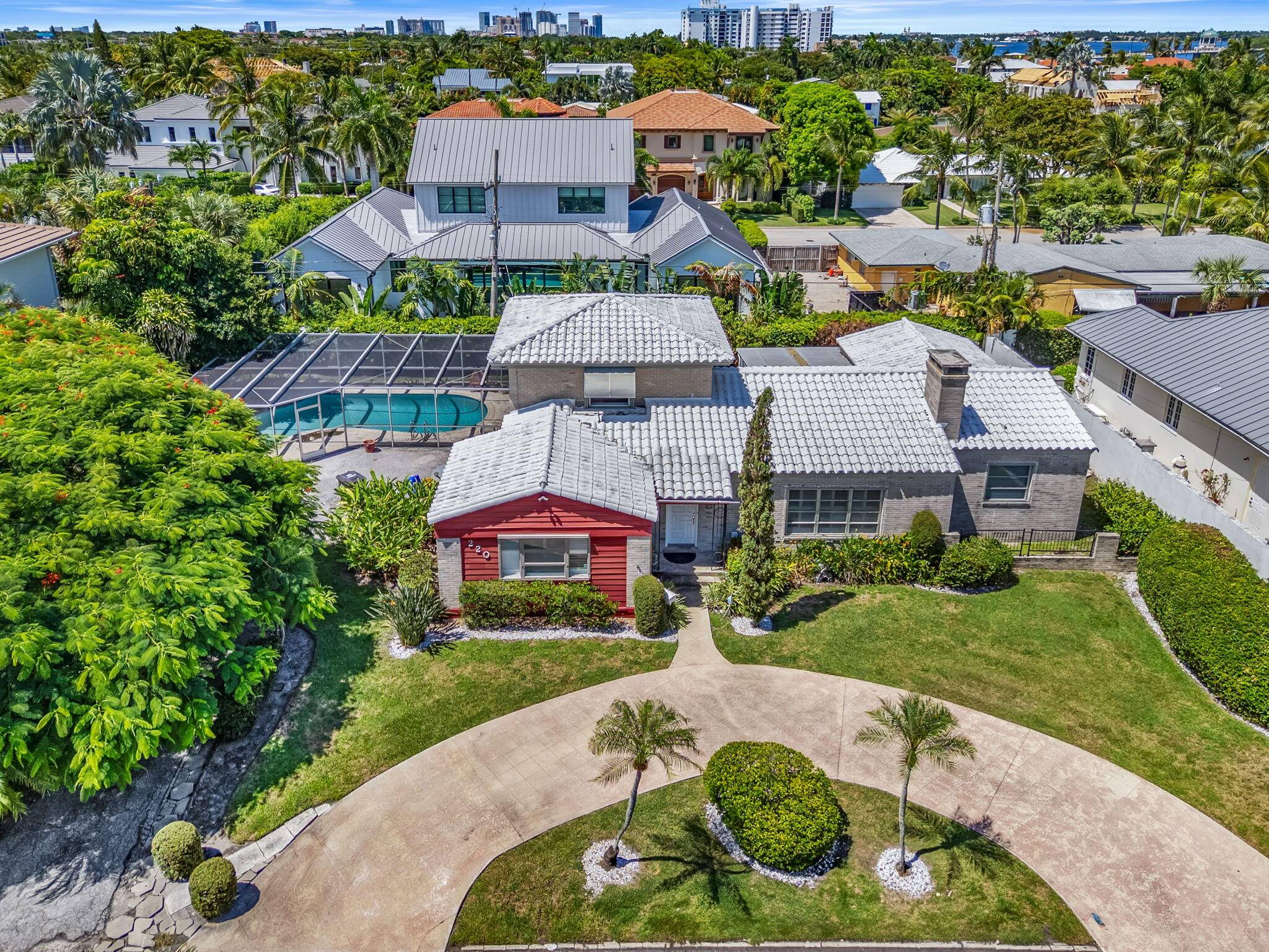 Nestled on one of the most coveted and character filled streets in West Palm Beach, 220 Rilyn Drive offers a rare chance to design the home you've always imagined.