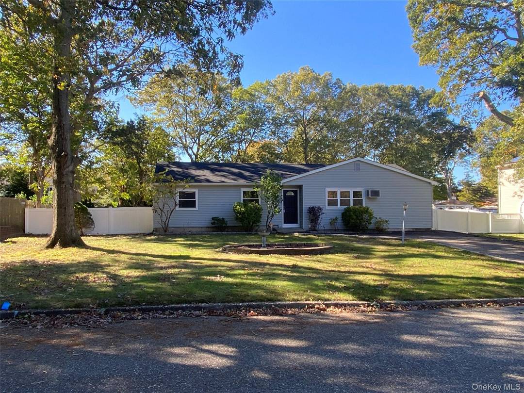 Come see this Expanded Ranch in the very picturesque section of Coram !