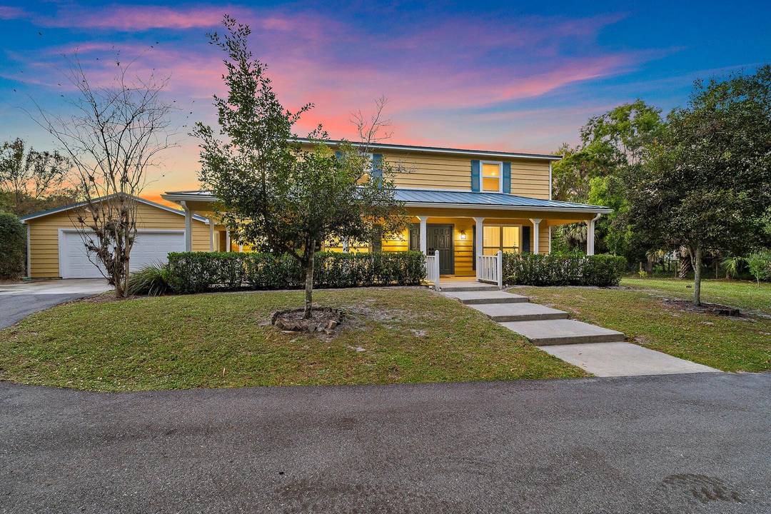 Experience the very best of Florida living in this fully remodeled estate home set on over 2.