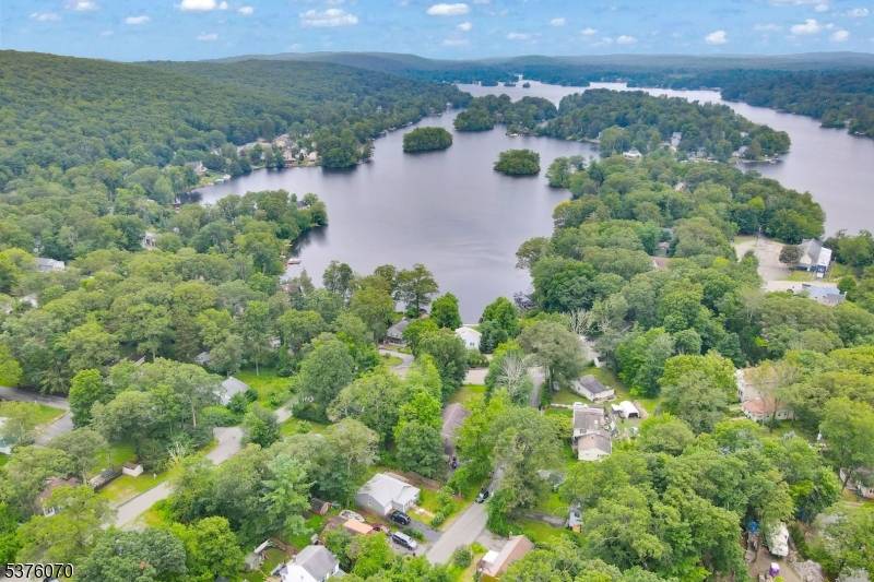 Well Kept Expanded Ranch With Large Rooms, High Ceilings And Tons of Storage.