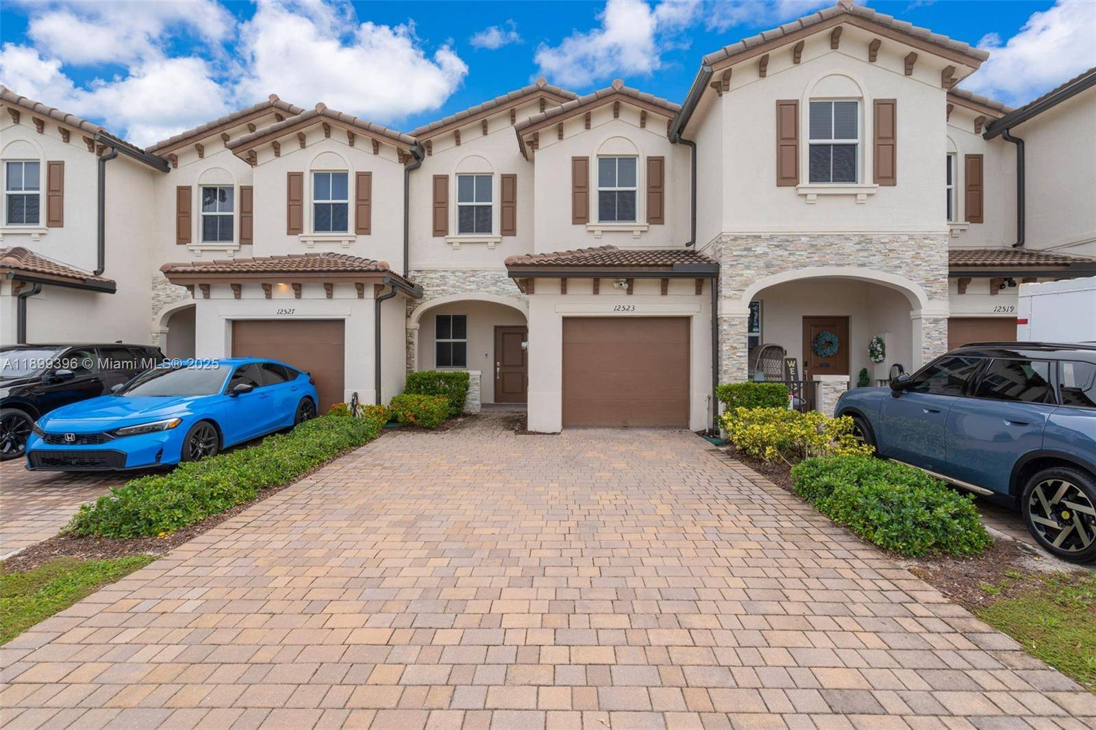 This newly built townhome features bright, contemporary interiors and a spacious master suite that includes a walk in closet, dual vanities, and a stand up shower.