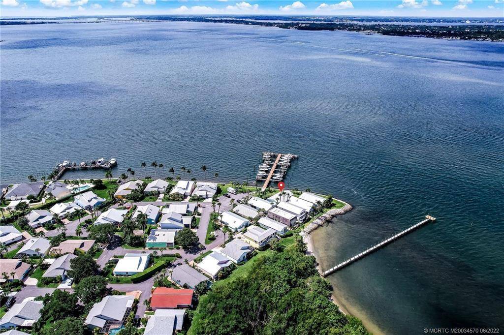 This stunning home comes with spectacular wide water views of the Indian River.