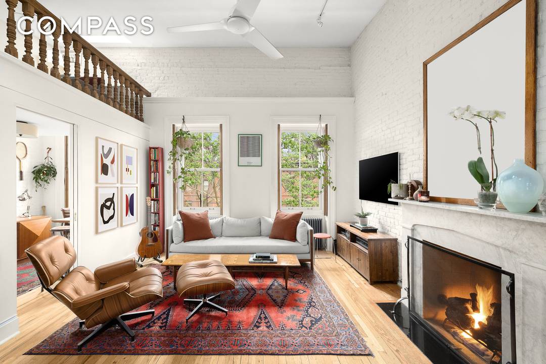 Welcome to 33 Tompkins Place, 3, a stunning multi level CONDO in a historic brownstone on one of the most coveted blocks in prime Cobble Hill.