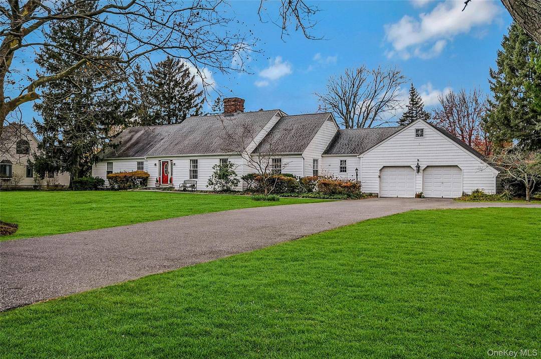 Perfectly positioned on the 17th hole of the North Fork Country Club, this spacious 5 bedroom, 4 bath home invites you to experience the very best of North Fork living.