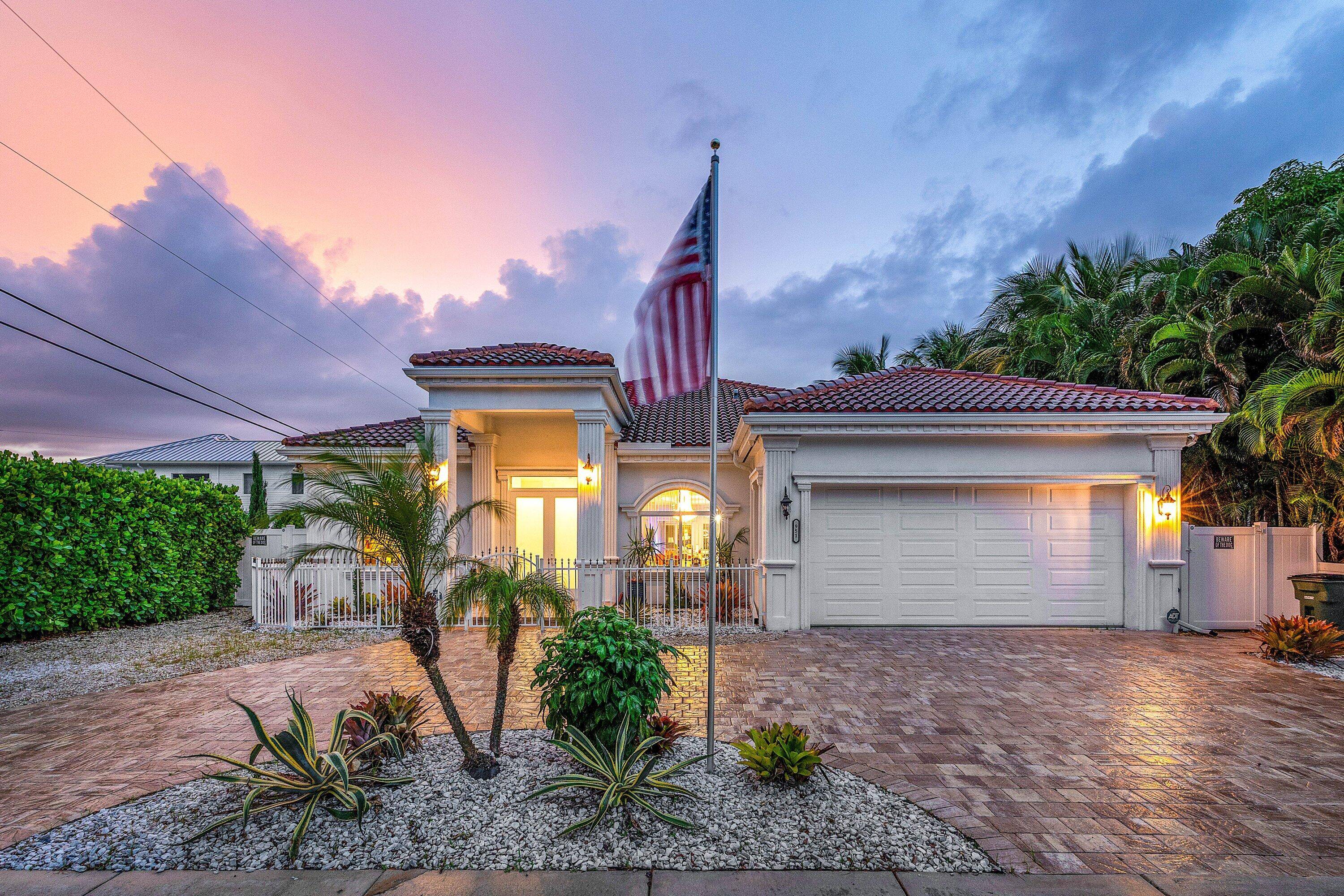 Welcome to 951 NW 2nd Avenue, a stunning 2019 built single story residence that perfectly combines modern sophistication with timeless comfort.
