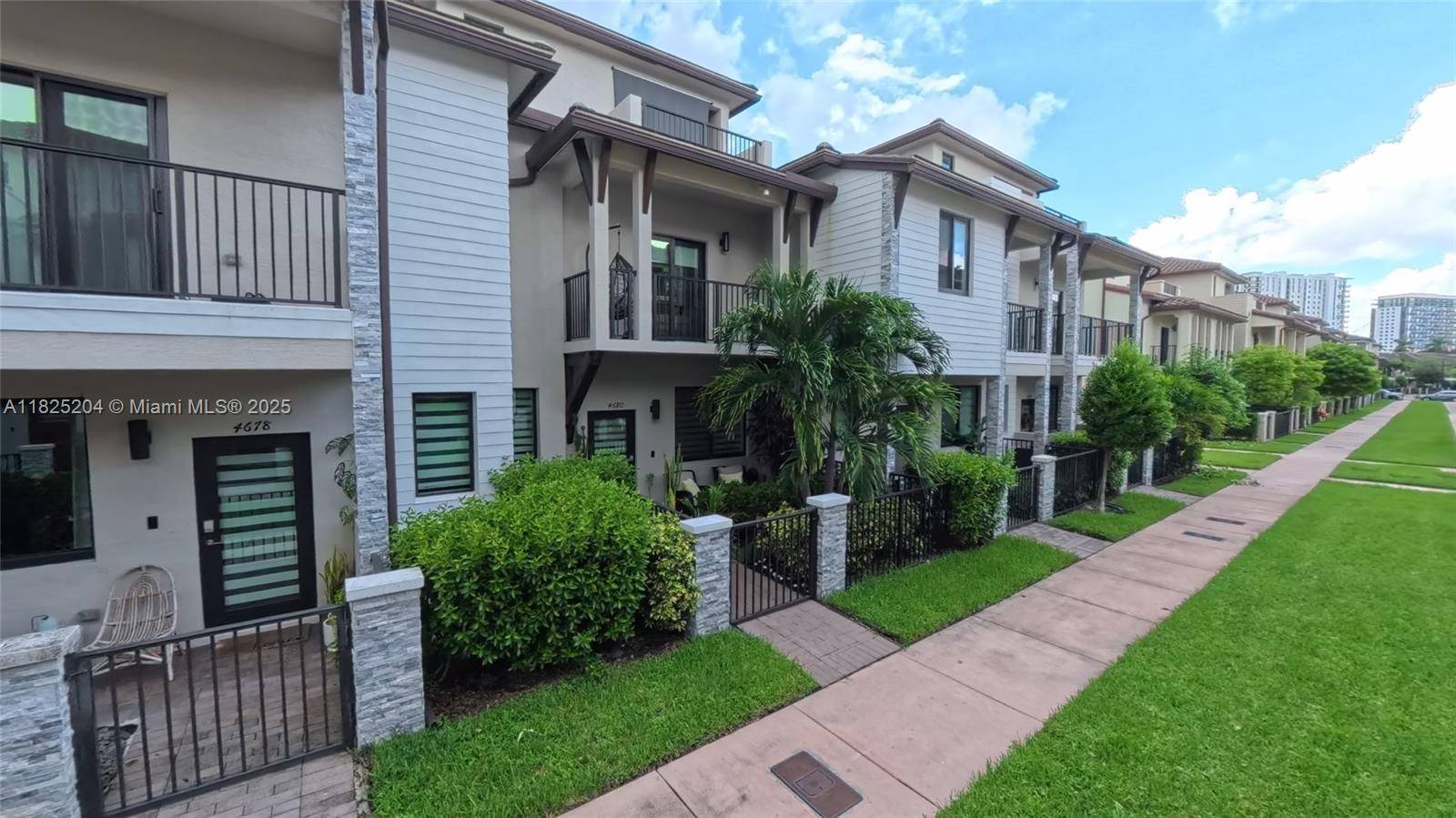 Stunning 3 story townhouse in the prestigious Urbana community of Downtown Doral, built in 2020 with modern elegance and superior craftsmanship.
