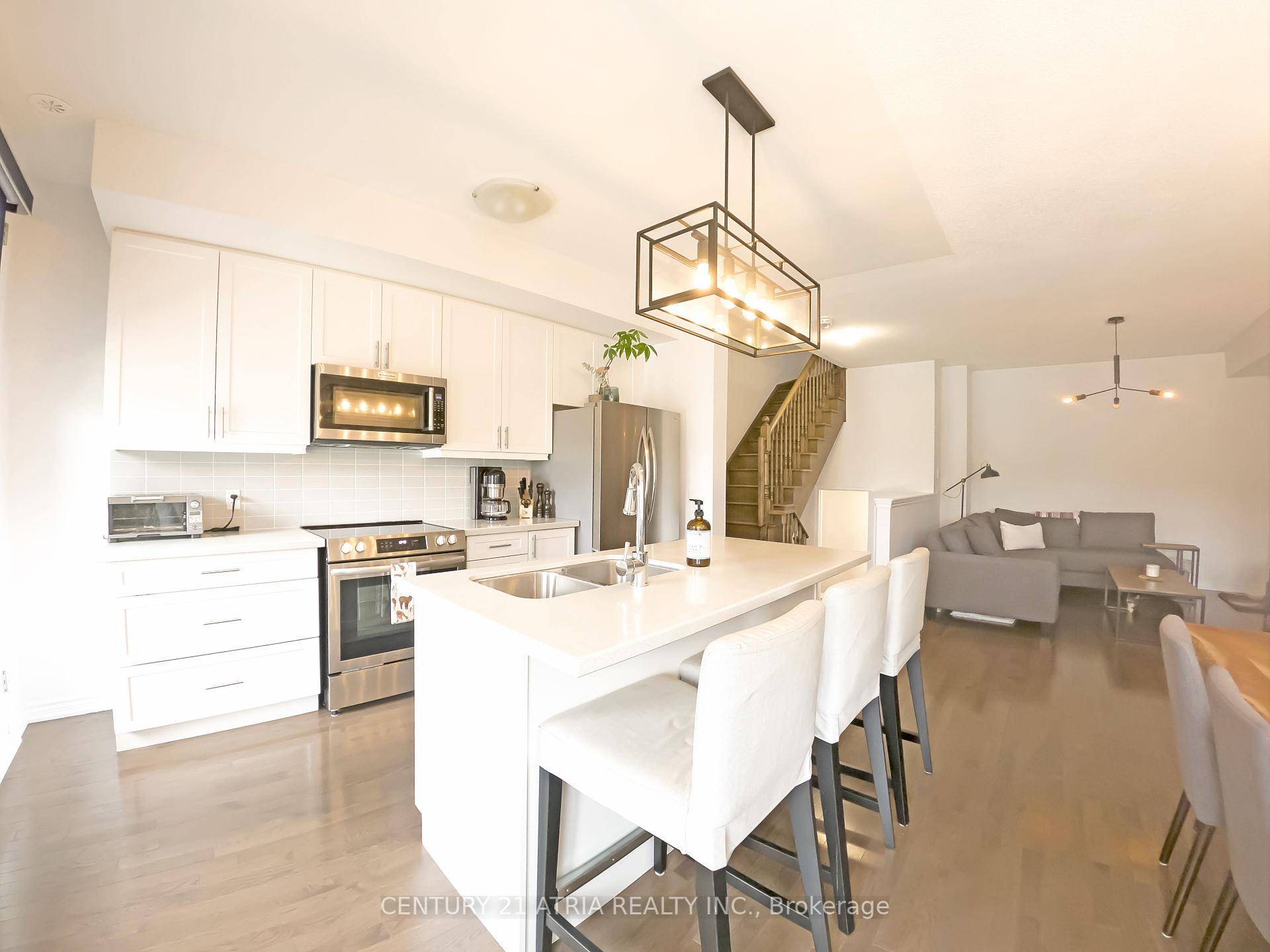A Rare Gem ! This Uptown Core freehold townhouse offers captivating eastern city views from two balconies and a spacious 412 sq.