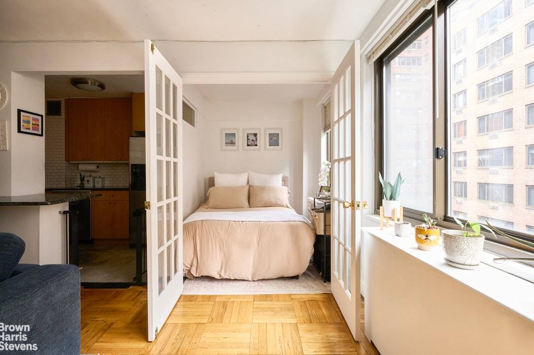 Welcome to this thoughtfully designed 550 square foot alcove studio, where comfort meets sophistication.