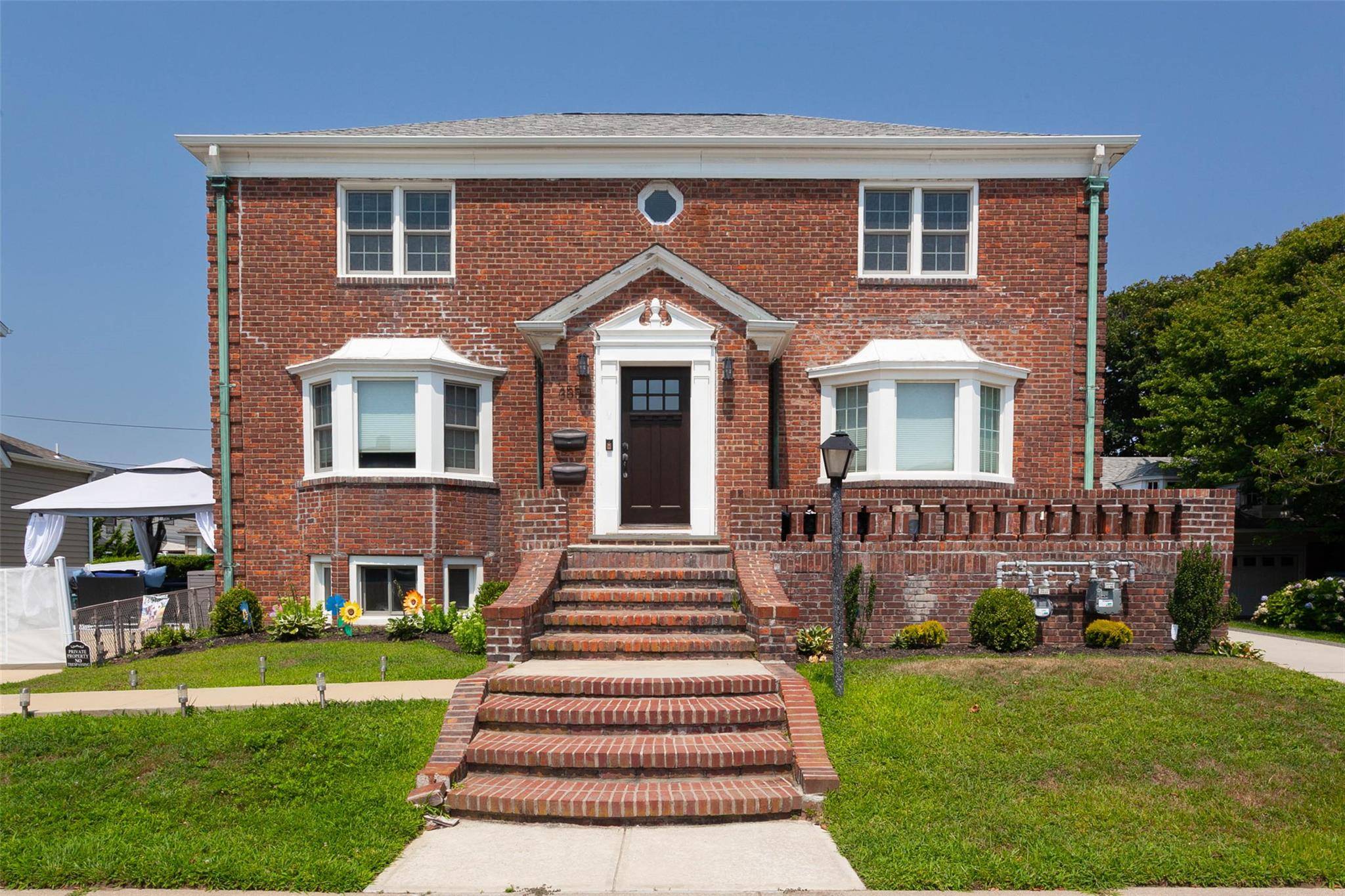 Classic Center Hall Colonial Step into this spacious home featuring a welcoming center hall layout, spacious living room, formal dining room, ana abright eat in kitchen that opens to your ...