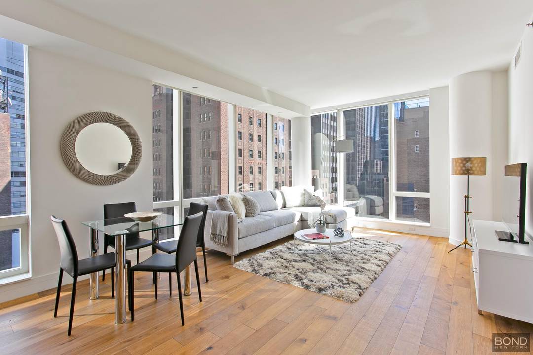 A spacious 753 SF sunfilled corner onebedroom with east, west, and north exposures.