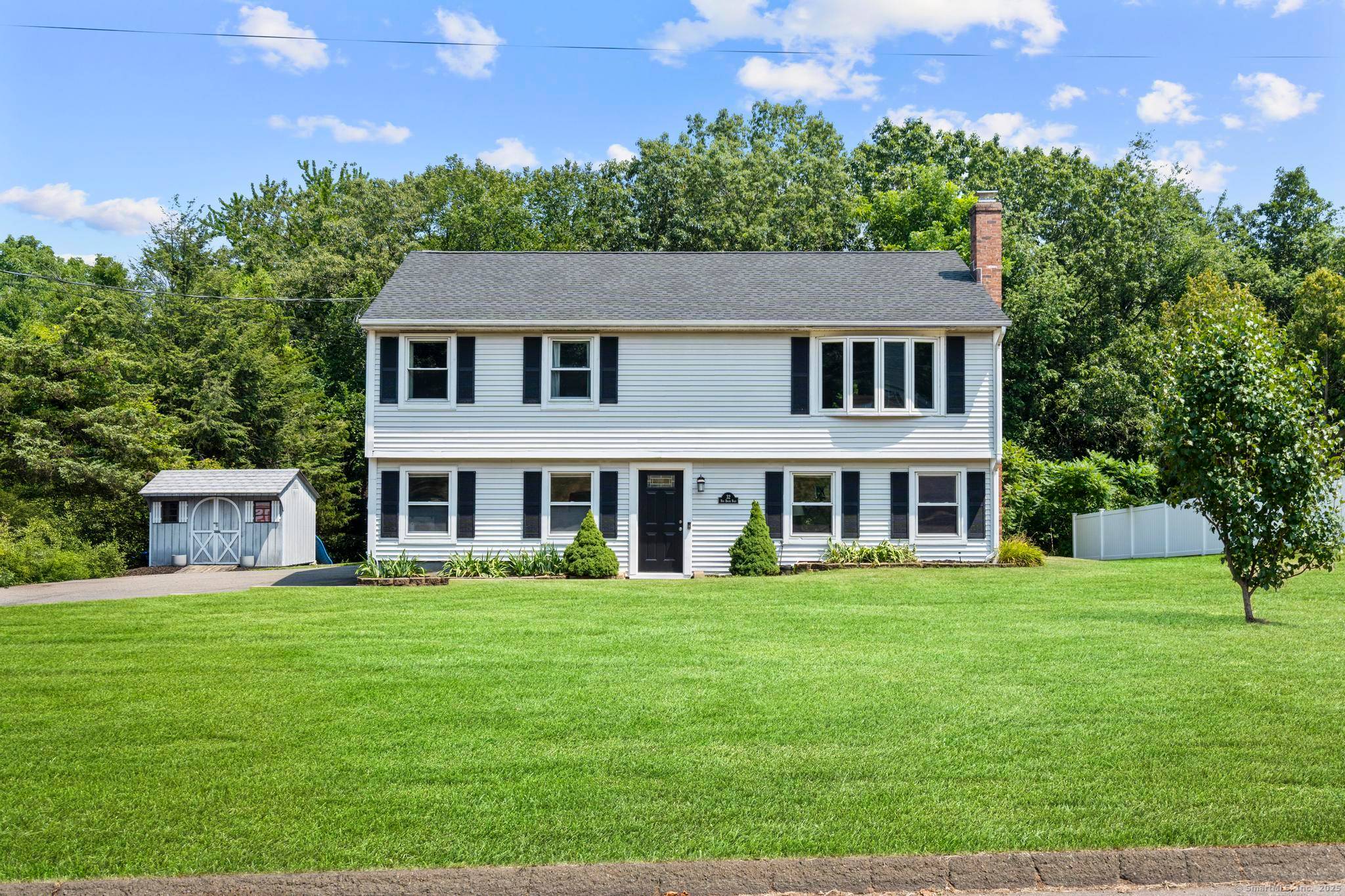 Welcome to 32 Nod Brook Road This unique raised ranch offers a rare layout fully above grade with versatile living spaces thoughtful upgrades throughout.