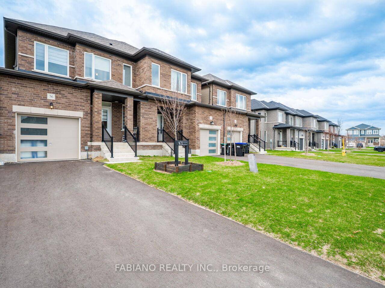 This Lovely 1 Year New Home Features An Open Concept Main Level With 9 foot Ceilings, Gleaming Hardwood Floors, Upgraded White Eat In Kitchen With Walk Out to Backyard.