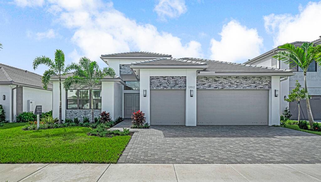 Embrace the epitome of modern living in this brand new construction home, nestled within the prestigious Apex at Avenir community in Palm Beach Gardens.