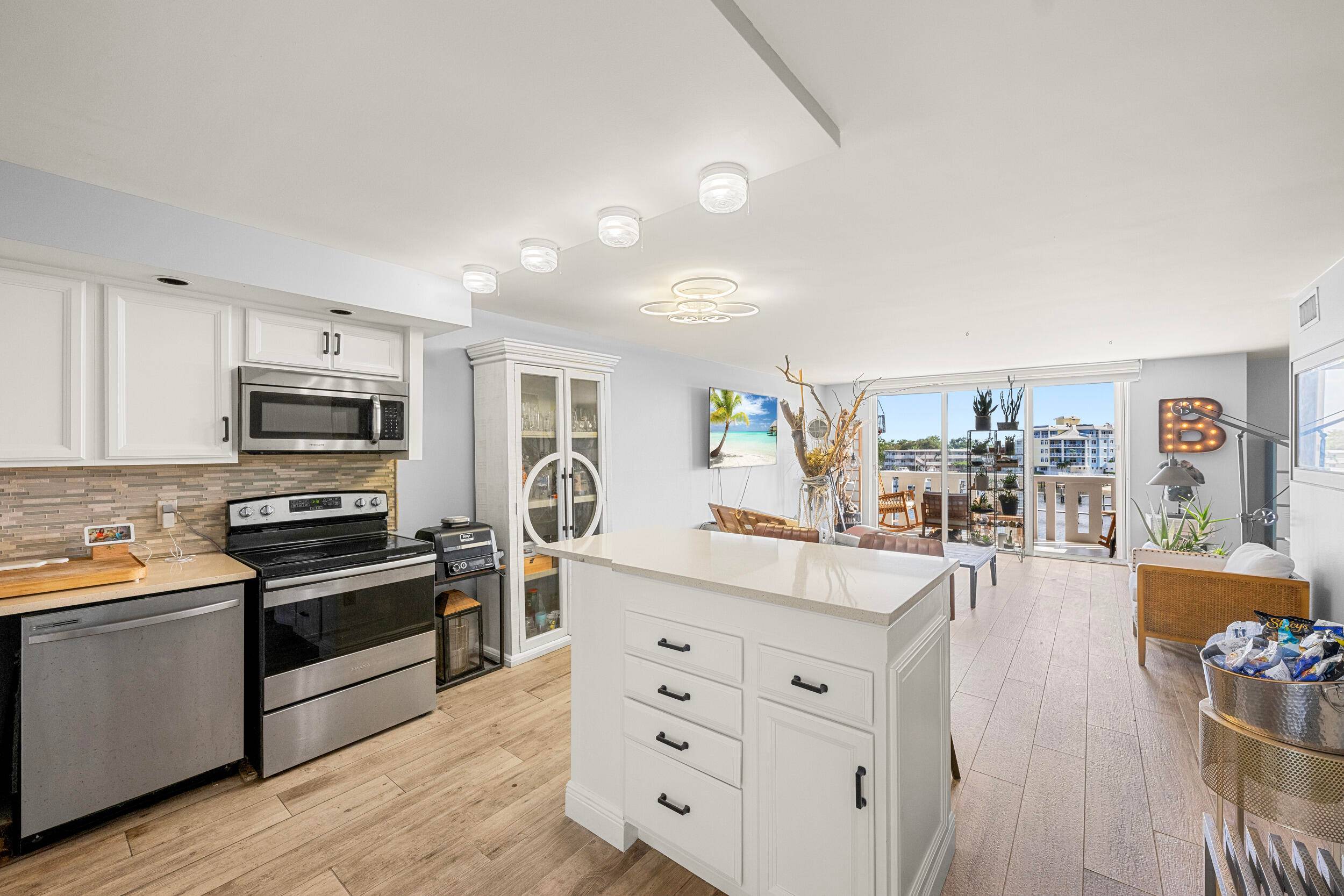 This beautifully remodeled and oasis offers premium finishes throughout.