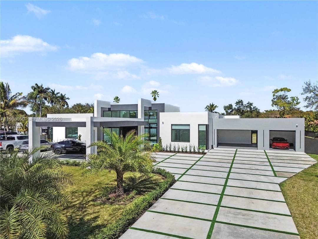 Experience elevated living in this breathtaking modern luxury estate situated on 1.