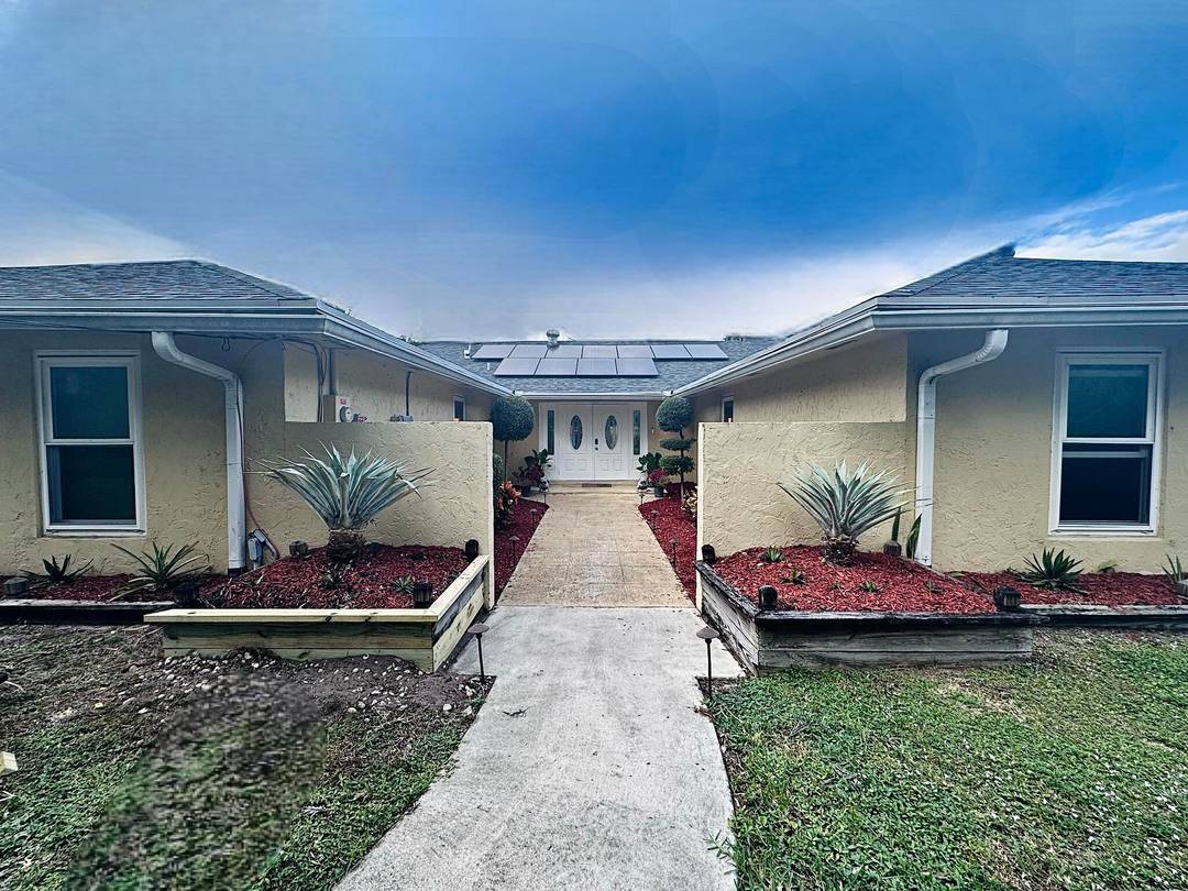Welcome to this beautifully maintained home tucked away in a peaceful Lake Worth neighborhood.