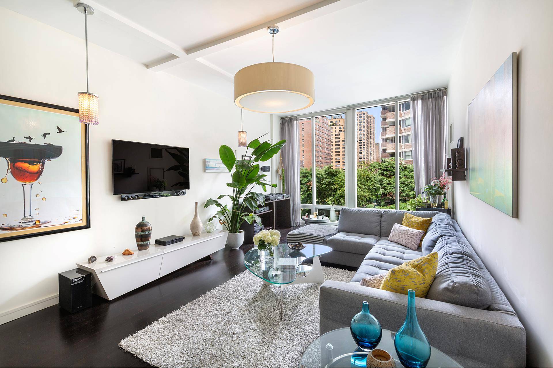 Immaculate Loft Like 764 square foot one bedroom, one bathroom residence overlooking beautiful mature trees from floor to ceiling windows and 10 foot ceilings.