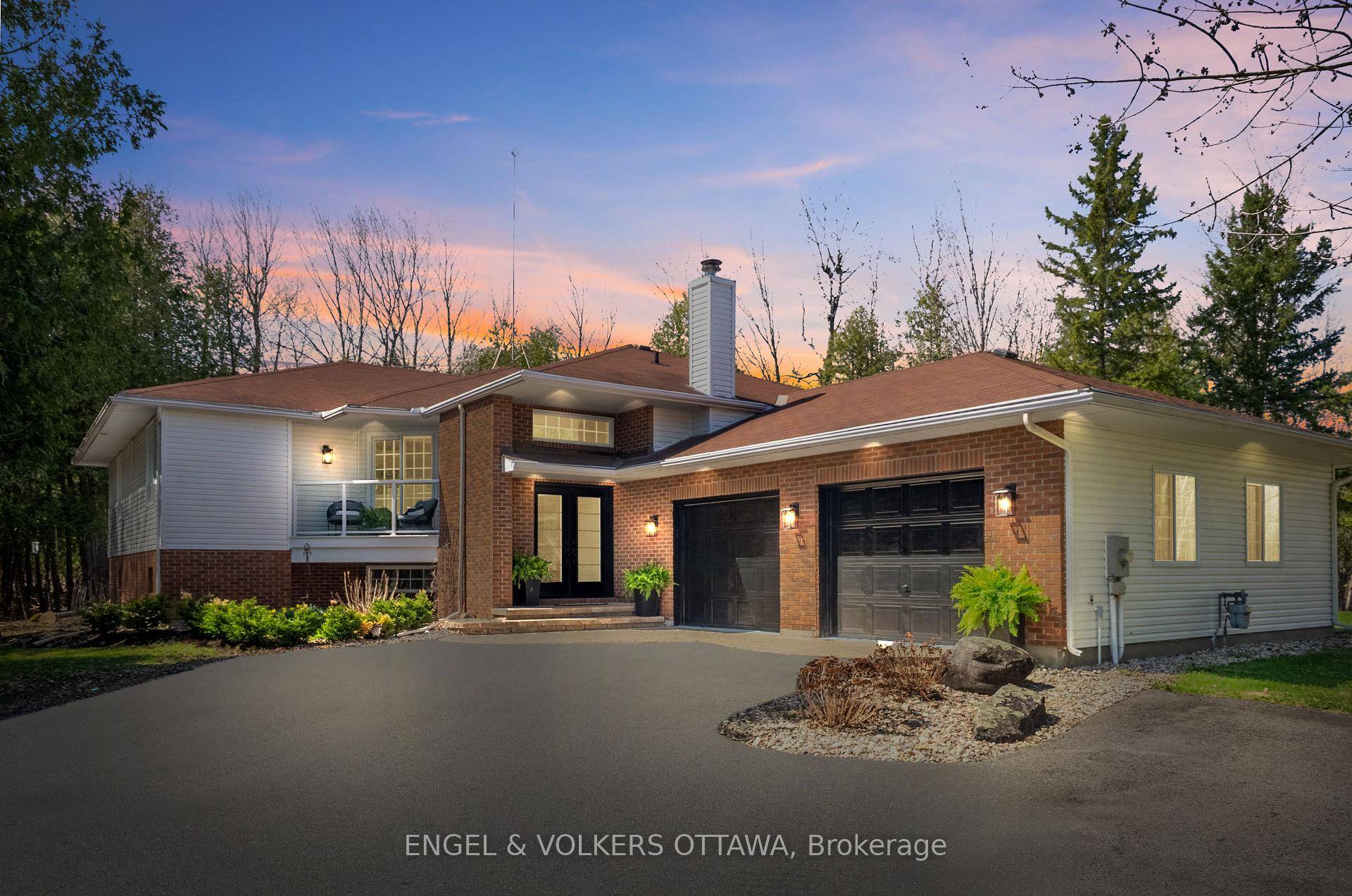 Welcome to 7359 Marcella Drive, a private 2 acre retreat in Greely on a quiet no through traffic street.