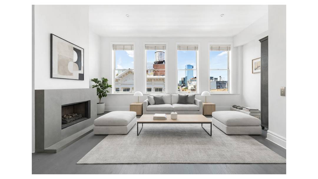 The Eklund Gomes Team presents this rare Prewar High Floor 3 bed 3 bath Loft Condo in Soho.