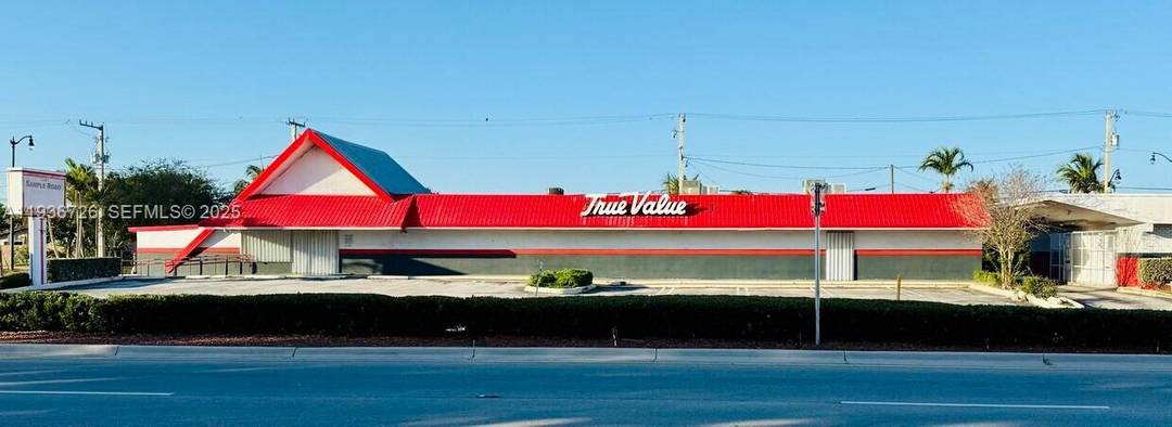 9, 256 SF freestanding corner retail building located on high traffic E Sample Road in Pompano Beach.