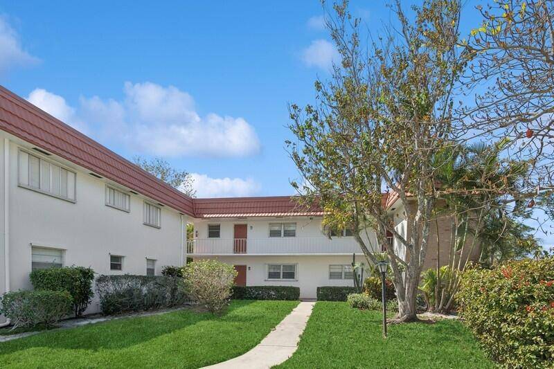 Highly Desirable First Floor Unit in Building J Steps from the Clubhouse !