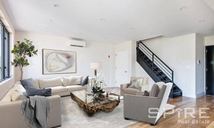 Sprawling 2 bedroom, 2 bath loft like duplex with outdoor space and W D in unit.
