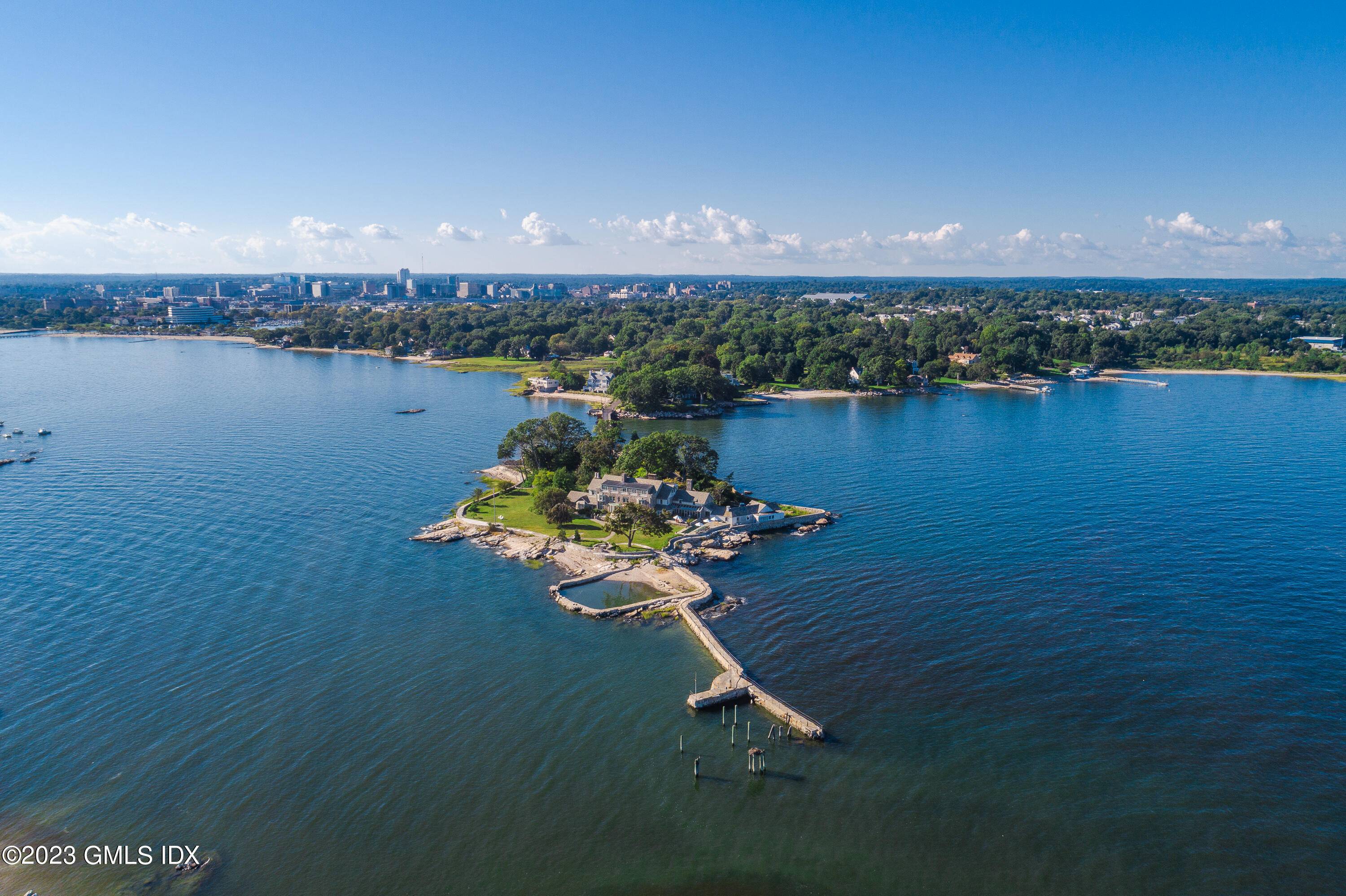 Private 3. 5 acre ''Caritas Island'' on Long Island Sound with 300 degree cinematic waterfront views.