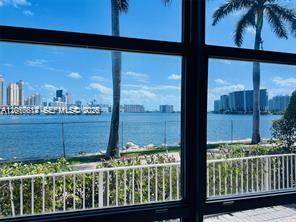 THIS UNIT IS UNIQUE ! FIRST FLOOR CORNER UNIT RIGHT ON THE INTERCOASTAL WITH VIEWS THAT ARE SIMILAR TO LIVING ON A CRUISE SHIP.