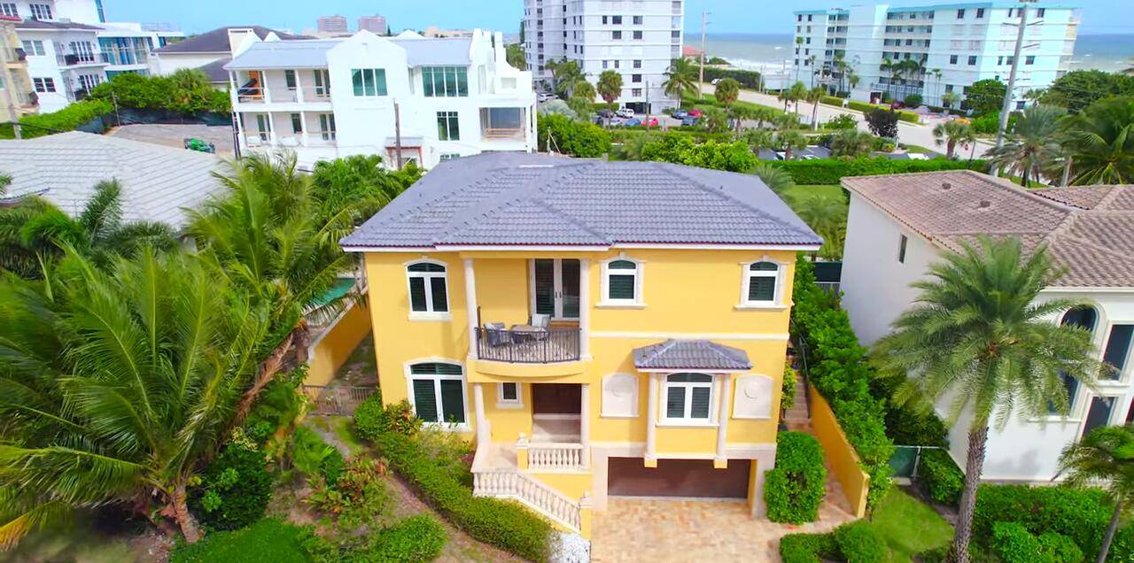 Nestled in the exclusive beachfront community of Surfside Hills in Juno Beach, this stunning custom built beach house offers luxurious coastal living steps to the beach.