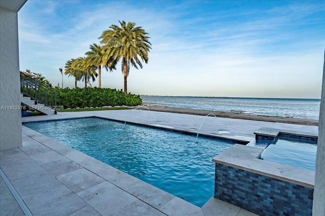 JUST COMPLETED SEPTEMBER 2025 SELLER FINANCING AVAILABLE Nestled on the exclusive, gated island of Sunrise Isles in Marathon, Florida Keys, this magnificent new construction oceanfront estate redefines luxury living.