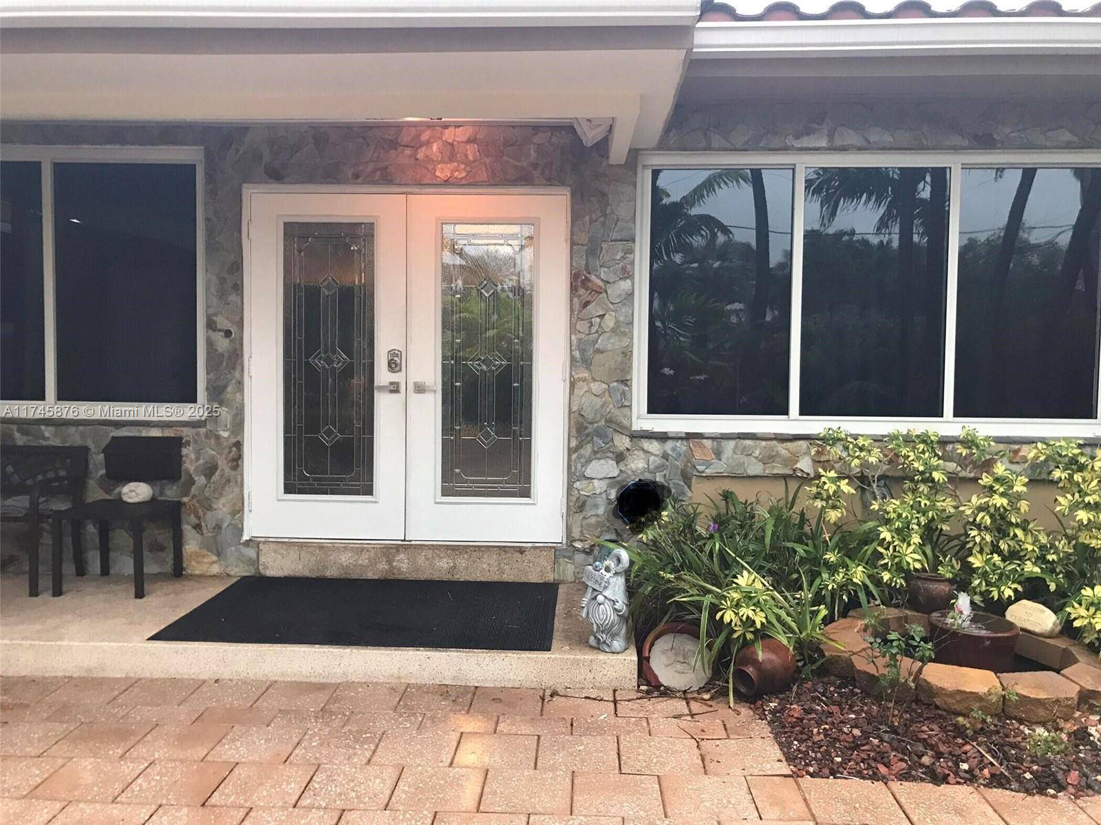 Motivated seller on Biscayne Point Island waterfront, NO FIXED BRIDGES, 2 docks, GUARD gated, garage.