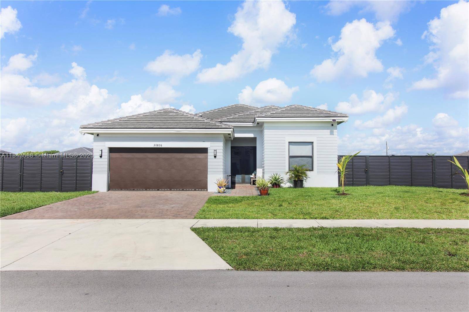 Spacious corner one story SFR.
